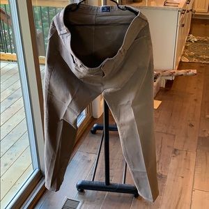 AG jeans 38x32 tan.  The graduate  tailored leg